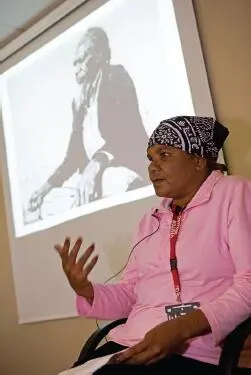 FIGURE 33Theresa Napurrula Ross in front of a photo of her father tells the - фото 19