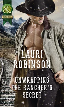 Lauri Robinson Unwrapping The Rancher's Secret обложка книги