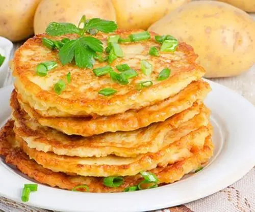 Ingrédients 4 grosses pommes de terre râpées 1 cuillère à café de poudre de - фото 7