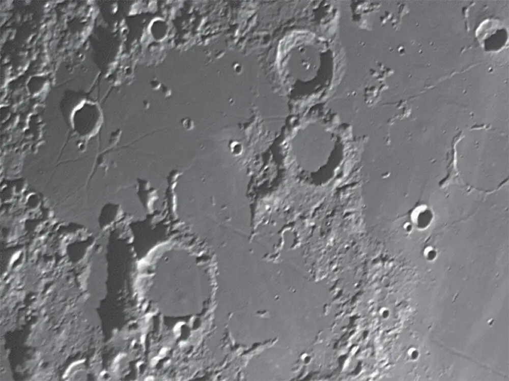 Figure 112 Lunar craters In the eighteenth century the almost perfectly - фото 13