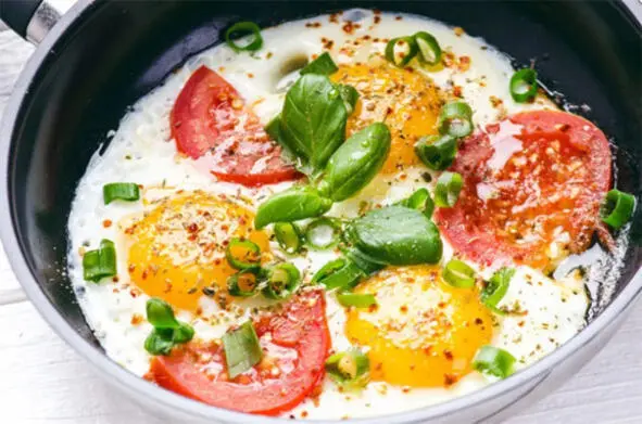Using a spoon make three pits in the sauce Drive an egg into each of them - фото 17