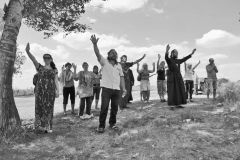 A group prays for peace on the outskirts of Mariupol August 2014 The - фото 43