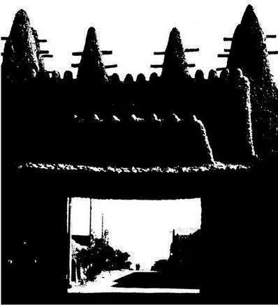 Ворота в город Тимииун построены в стиле суданской глиняной архитектуры - фото 1