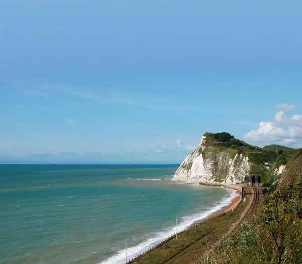 The scenic railway line between Folkestone and Dover burrows through - фото 5