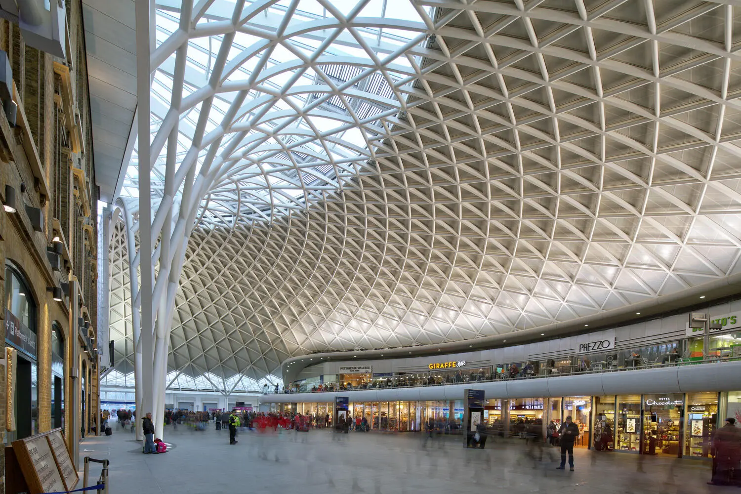 The spacious modern passenger departure concourse at Kings Cross station was - фото 7
