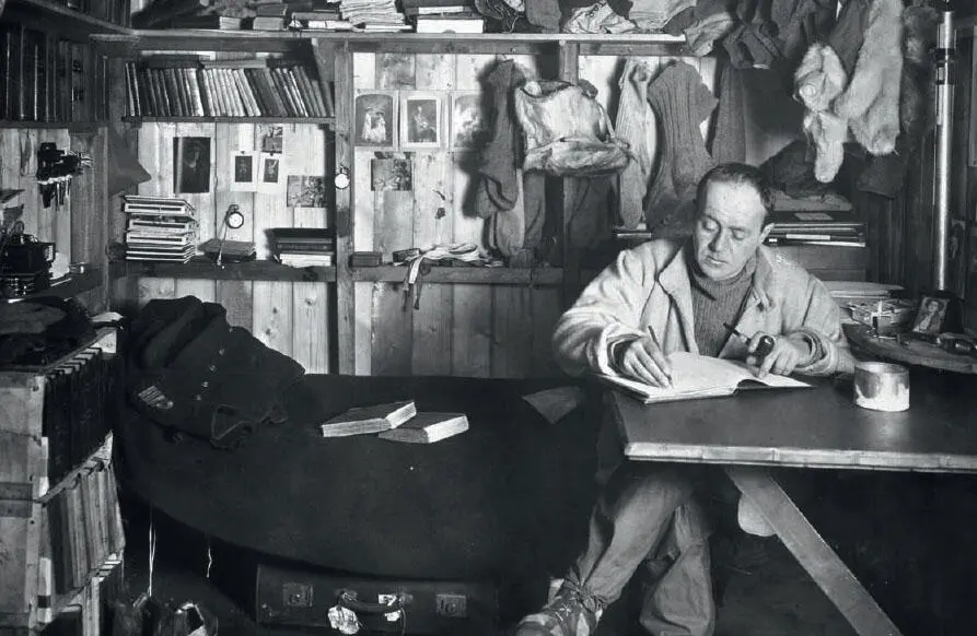Captain Scott writing in his journal in the expedition hut in October 1911 - фото 18