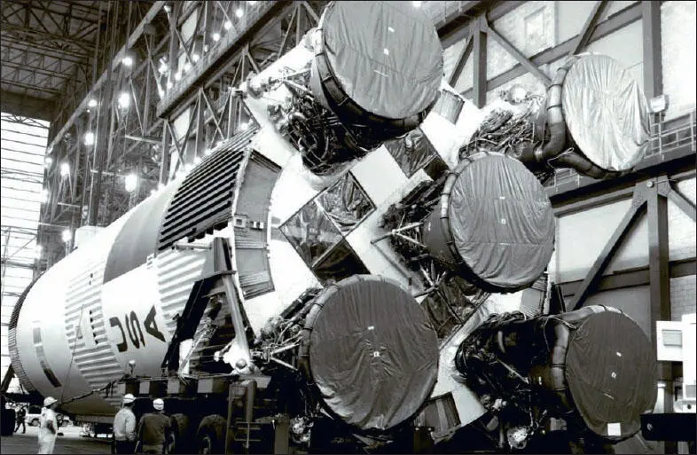 The Saturn V rocket being prepared and taken to the launch pad in 1969 But - фото 5
