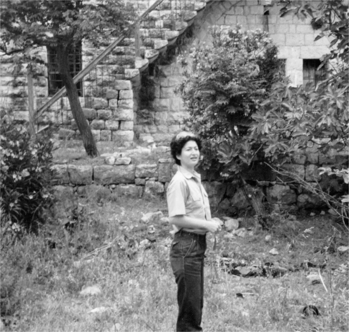 Anissa standing in front of one side of alDar in Mashta elHelou her fathers - фото 2