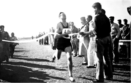 Louie wins the 1933 UCLA Cross Country twomile race by more than a quarter of - фото 4