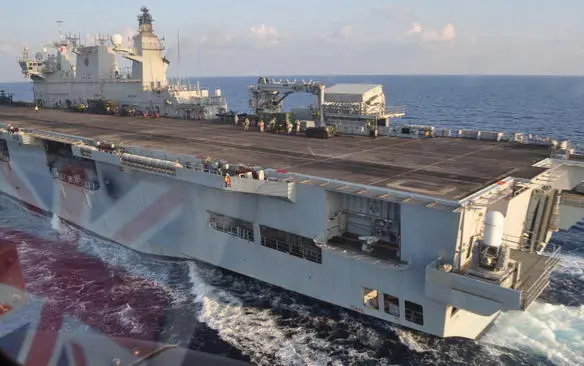 Approaching HMS Ocean Deck landing training Behind the Apache is a Sea King - фото 11