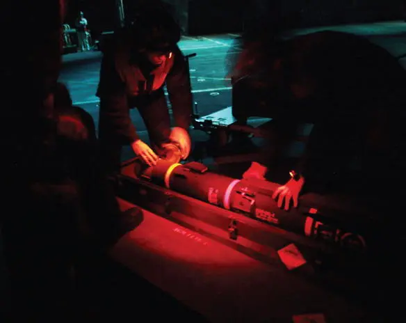 Hellfire being prepared on the flight deck Published by the Ministry of - фото 14
