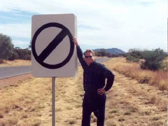 My friend Gerald at a No Speed Limit sign just outside Alice Springs 2001 - фото 29