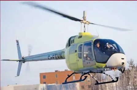Второй летный экземпляр нового легкого пятиместного вертолета Bell 505 - фото 29
