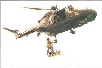 Поисковоспасательный вариант вертолета Супер Линкс Боевой вертолет - фото 12