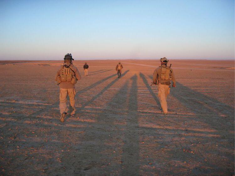 Walking into the Iraqi desert for exfil after a long night of work - фото 38