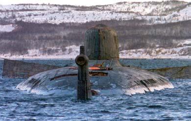 The wreck of the Kursk rising in the well of the floating dock at Rosljako In - фото 13