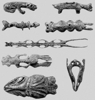 Ипиутак Прорезные фигурки животных из бивня найденные в погребениях 1я пол - фото 2