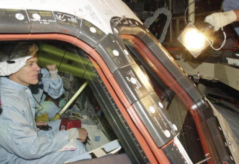 STS107 pilot Willie McCool in Columbia s cockpit during the crew equipment - фото 28