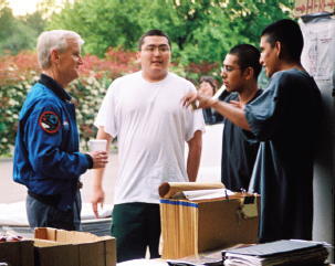 Astronaut John Casper chats with members of a Native American fire crew at the - фото 63