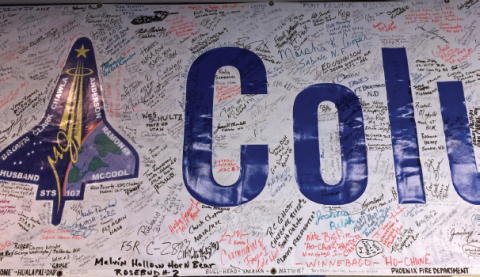 A portion of an STS107 COLUMBIA RECOVERY TEAM banner bearing thousands of - фото 64