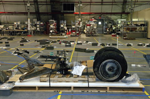 Columbia s nose landing gear sits amidst other recovered pieces of the - фото 69