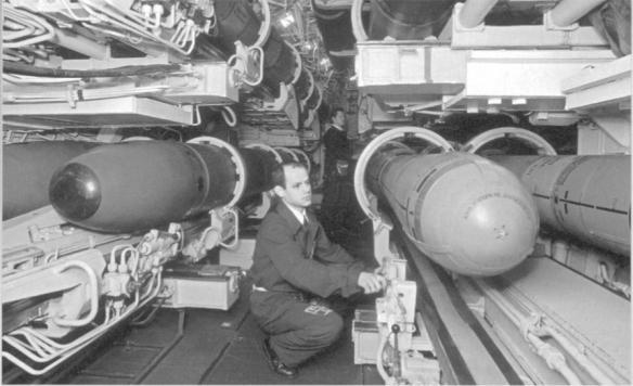 The torpedo room of an Oscar II nuclear submarine In an identical compartment - фото 10