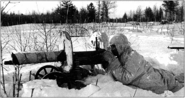 Пулеметный расчет в снегах Подмосковья Западный фронт зима 194142 года В - фото 50